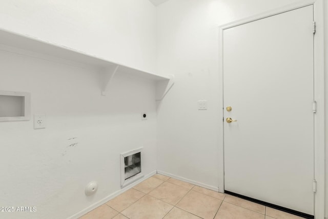 12726 W Charter Oak Rd, El Mirage, AZ 85335 - clothes washing area with hookup for an electric dryer, baseboards, gas dryer hookup, laundry area, and light tile patterned floors