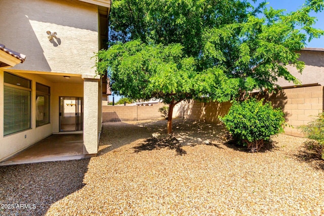 12726 W Charter Oak Rd, El Mirage, AZ 85335 - view of yard with a fenced backyard and a patio area