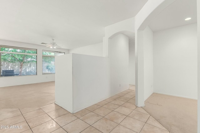 12726 W Charter Oak Rd, El Mirage, AZ 85335 - unfurnished room with recessed lighting, light carpet, light tile patterned floors, arched walkways, and ceiling fan