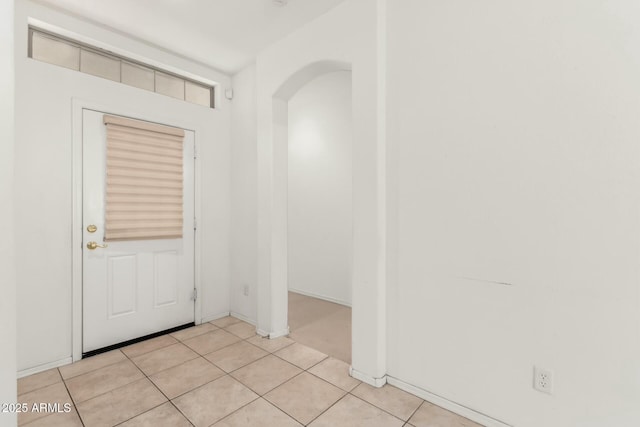 12726 W Charter Oak Rd, El Mirage, AZ 85335 - entrance foyer with arched walkways and light tile patterned floors
