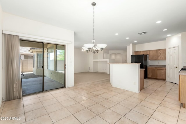 12726 W Charter Oak Rd, El Mirage, AZ 85335 - kitchen with a center island, light tile patterned flooring, visible vents, recessed lighting, and a chandelier