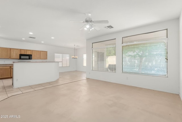 12726 W Charter Oak Rd, El Mirage, AZ 85335 - unfurnished living room with visible vents, recessed lighting, and ceiling fan