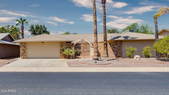 ranch-style home with a garage