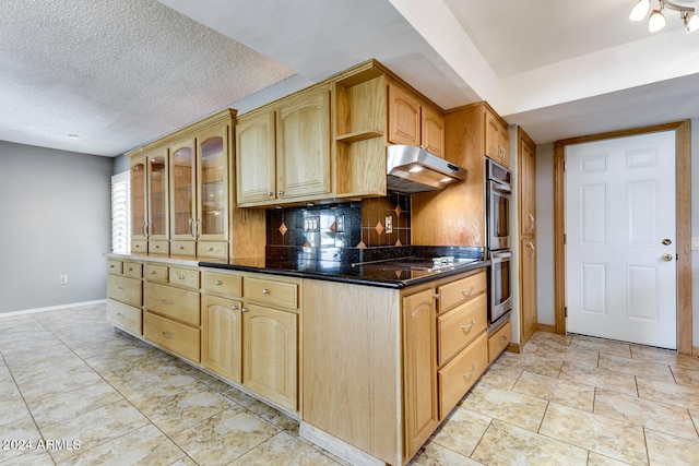 kitchen with double oven, backsplash, a textured ceiling, black electric stovetop, and light brown cabinets