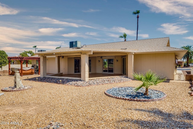 back of property featuring a patio area