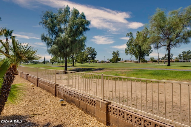 surrounding community featuring a lawn