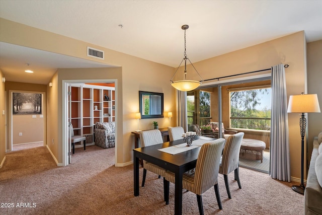19700 N 76th St Unit 2089, Scottsdale, AZ 85255 - dining area with baseboards, visible vents, and carpet