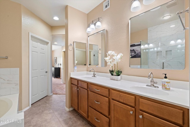 19700 N 76th St Unit 2089, Scottsdale, AZ 85255 - bathroom featuring visible vents, tiled shower, and a sink