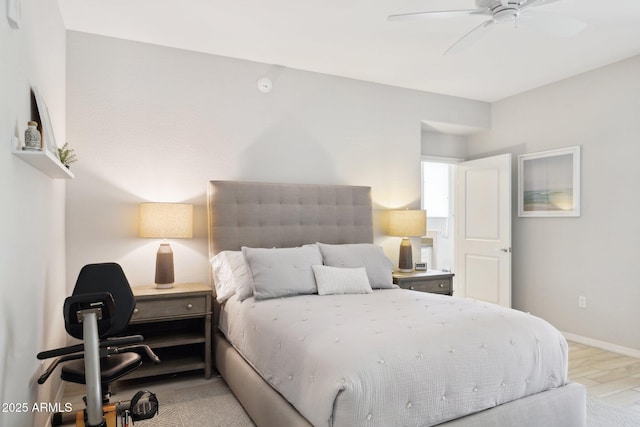 17850 N 68th St Unit 2138, Phoenix, AZ 85054 - bedroom with light wood-style floors, baseboards, and ceiling fan