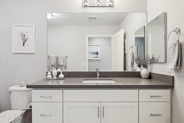 17850 N 68th St Unit 2138, Phoenix, AZ 85054 - bathroom featuring vanity and toilet