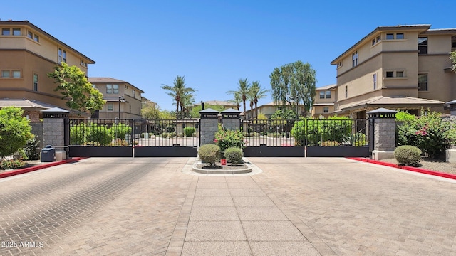 17850 N 68th St Unit 2138, Phoenix, AZ 85054 - view of decorative street with a gate, a gated entry, and a residential view