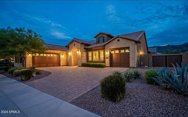 view of front of property featuring a garage