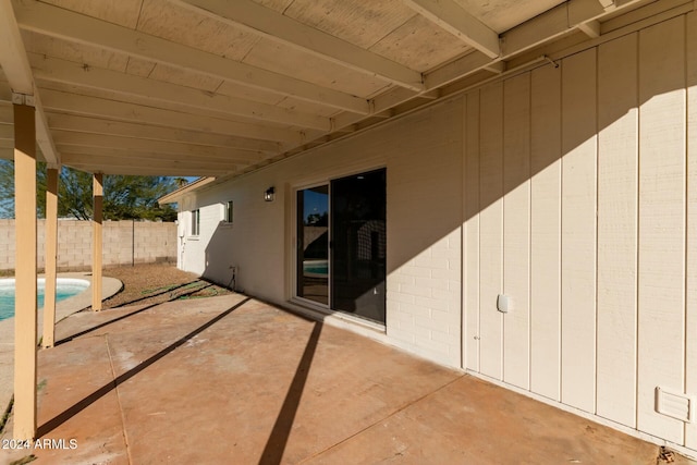 view of patio / terrace featuring a fenced in pool