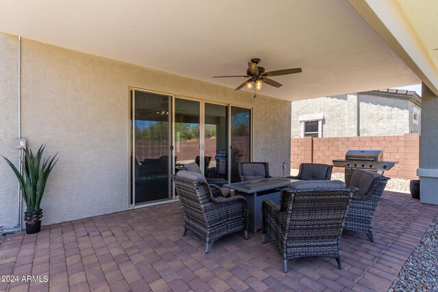 view of patio / terrace featuring ceiling fan