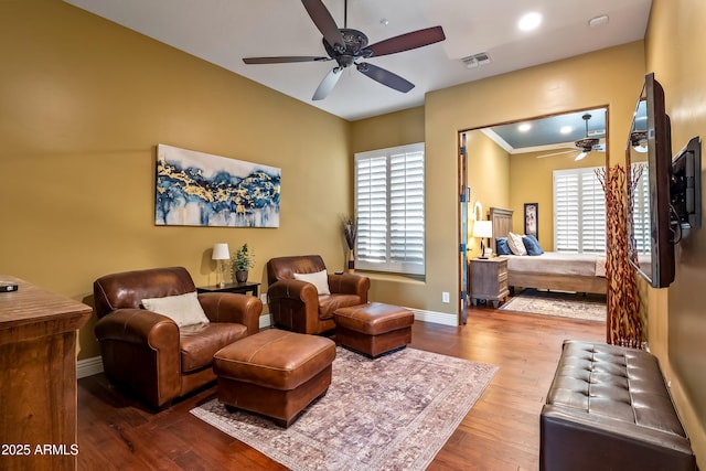 interior space with ceiling fan, recessed lighting, wood finished floors, visible vents, and baseboards