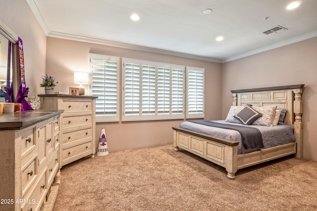 bedroom with light colored carpet, visible vents, crown molding, and recessed lighting