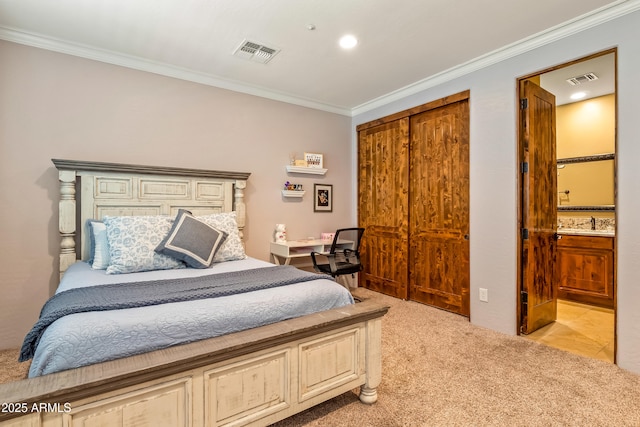 bedroom featuring light carpet, a closet, visible vents, and crown molding