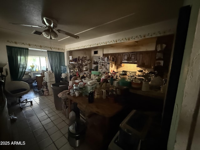 2030 N 21st Pl, Phoenix, AZ 85006 - miscellaneous room featuring dark tile patterned floors and ceiling fan