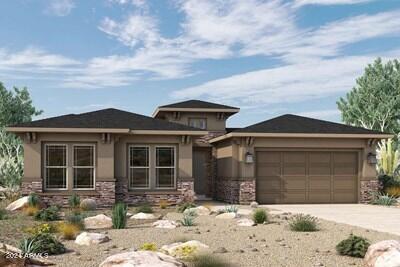 prairie-style house featuring a garage