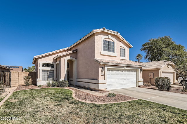 mediterranean / spanish-style home featuring stucco siding, a front yard, fence, a garage, and driveway