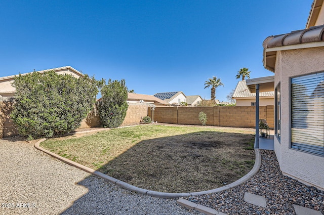 view of yard featuring a fenced backyard