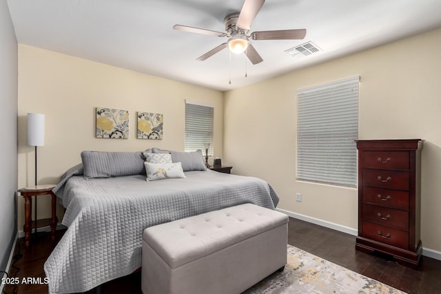 4043 E Carla Vista Dr, Gilbert, AZ 85295 - bedroom with wood finished floors, baseboards, and a ceiling fan