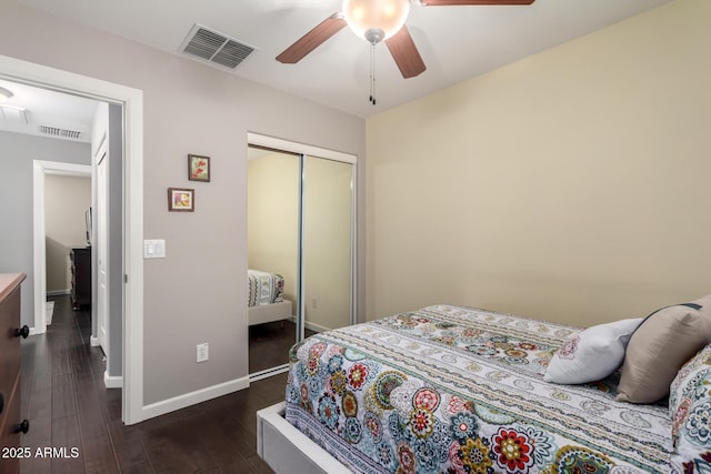 4043 E Carla Vista Dr, Gilbert, AZ 85295 - bedroom with a closet, baseboards, wood finished floors, and a ceiling fan