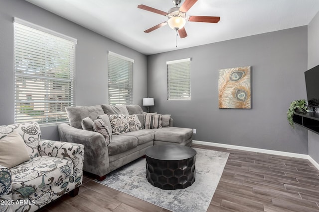 4043 E Carla Vista Dr, Gilbert, AZ 85295 - living room featuring ceiling fan, plenty of natural light, wood finished floors, and baseboards