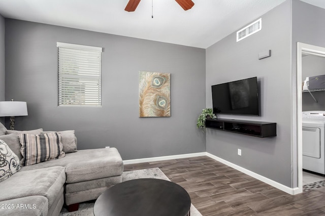 4043 E Carla Vista Dr, Gilbert, AZ 85295 - living room with washer / dryer, a ceiling fan, wood finished floors, and baseboards