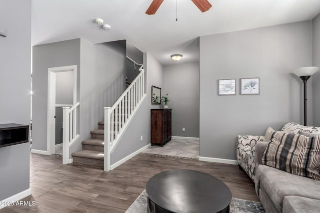 4043 E Carla Vista Dr, Gilbert, AZ 85295 - living room featuring ceiling fan, stairway, and wood finished floors
