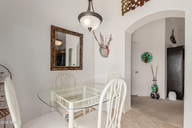 dining area with light carpet