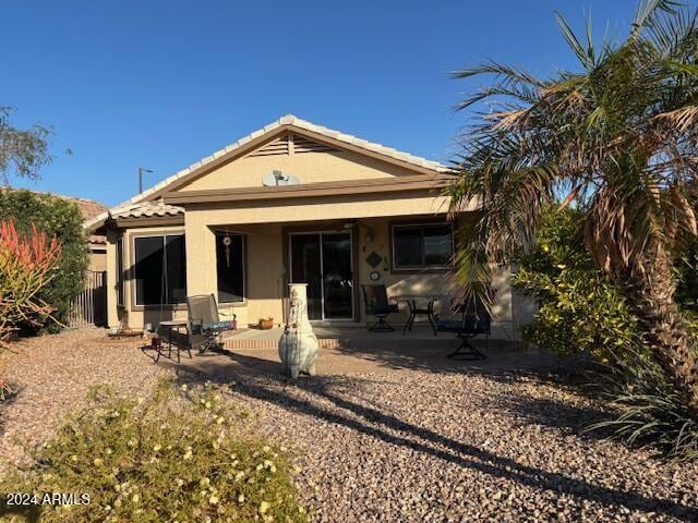 back of house featuring a patio