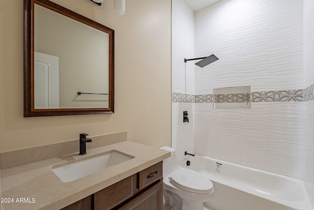 full bathroom featuring vanity, toilet, and washtub / shower combination