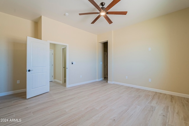 unfurnished bedroom featuring light hardwood / wood-style floors and ceiling fan