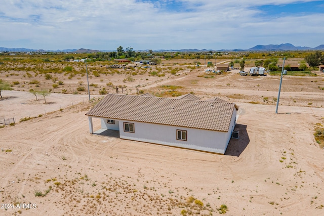 drone / aerial view featuring a mountain view