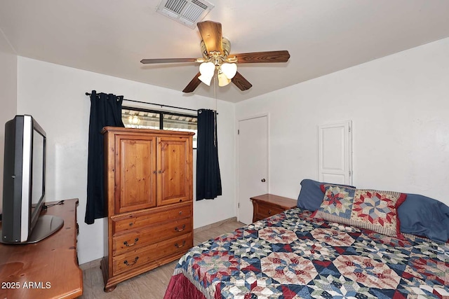 2619 W Lamar Rd, Phoenix, AZ 85017 - bedroom with visible vents, light wood finished floors, and ceiling fan