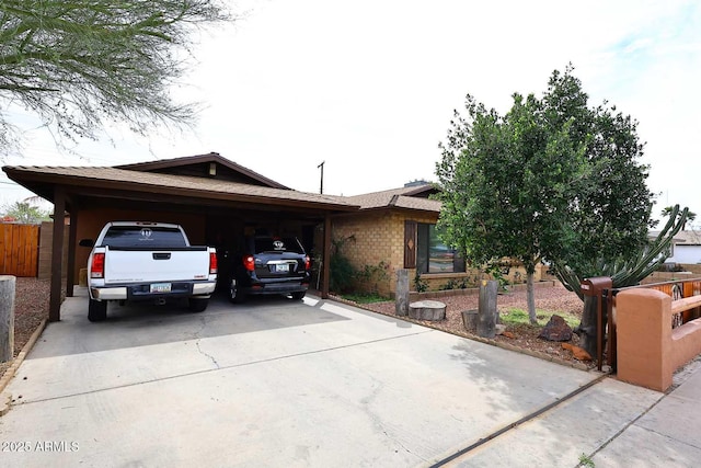 2619 W Lamar Rd, Phoenix, AZ 85017 - ranch-style house with concrete driveway and fence