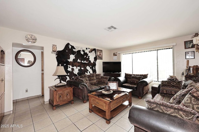 2619 W Lamar Rd, Phoenix, AZ 85017 - living room with light tile patterned floors and visible vents