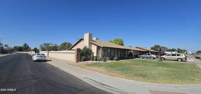 exterior space featuring a front yard