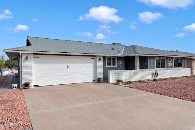 ranch-style house featuring a garage