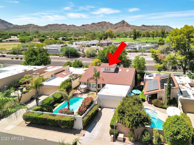 bird's eye view with a mountain view