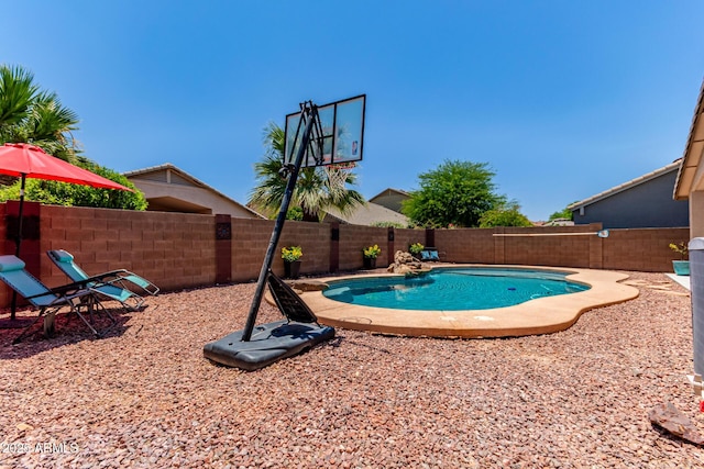 44853 W Jack Rabbit Trl, Maricopa, AZ 85139 - view of pool with a fenced backyard