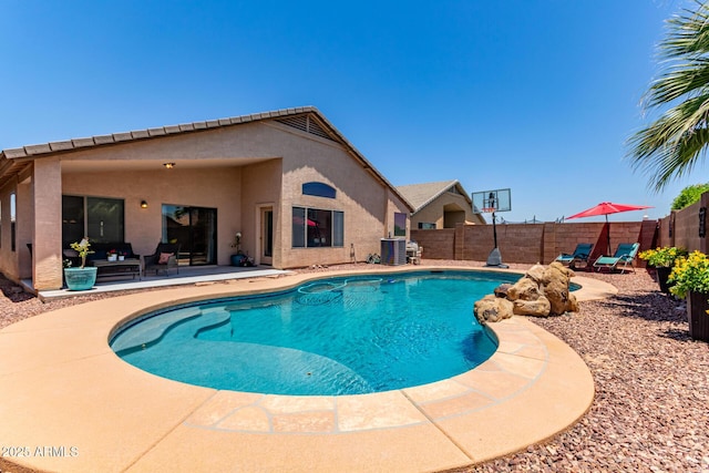 44853 W Jack Rabbit Trl, Maricopa, AZ 85139 - view of swimming pool featuring a patio area and a fenced backyard