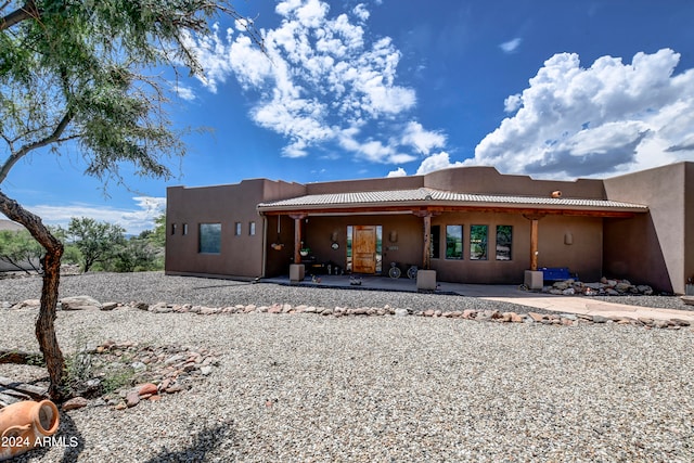 rear view of house with a patio area