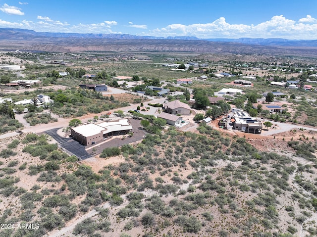 bird's eye view with a mountain view