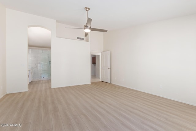 interior space with ceiling fan and light hardwood / wood-style flooring