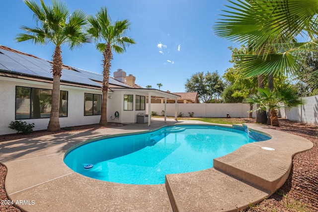 view of pool with a patio area