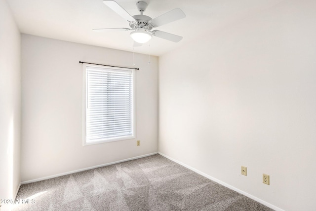 empty room with carpet floors and ceiling fan