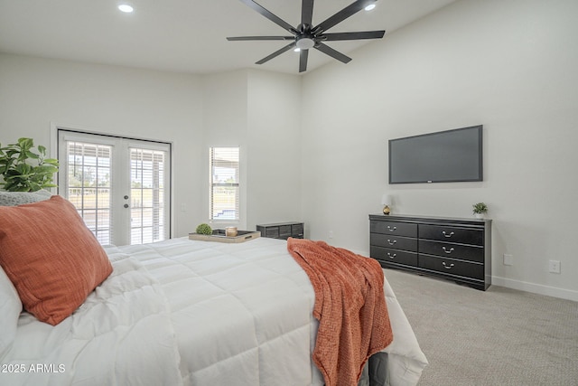 bedroom featuring french doors, ceiling fan, access to exterior, and light carpet