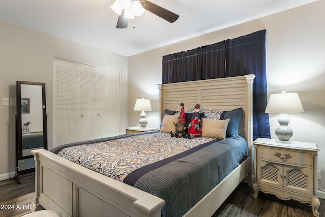 bedroom featuring dark hardwood / wood-style flooring, a closet, and ceiling fan